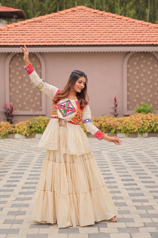 Garba Glow Cream Tiered Lehenga with Kutchi Jacket