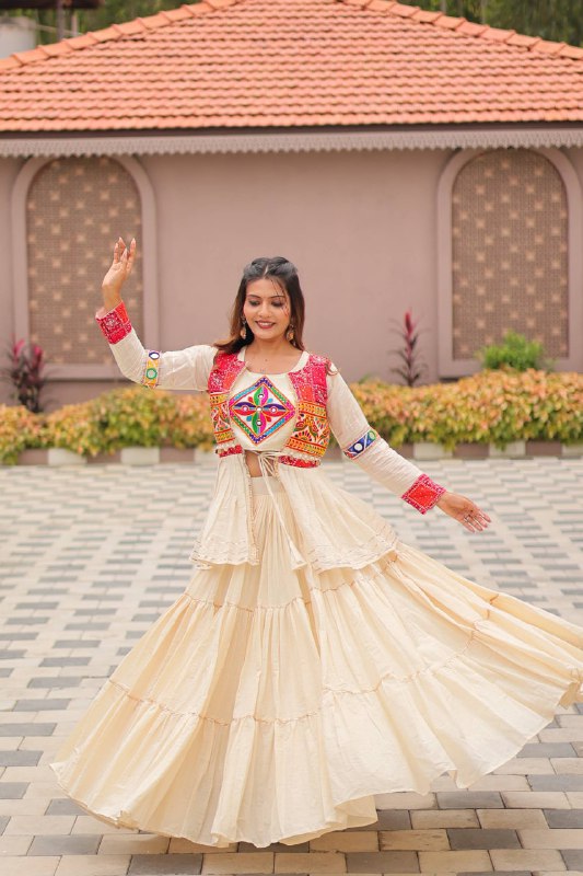 Garba Glow Cream Tiered Lehenga with Kutchi Jacket