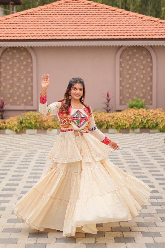 Garba Glow Cream Tiered Lehenga with Kutchi Jacket