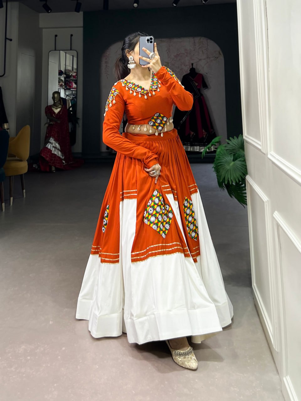 Kavya Orange & White Mirror Work and Shell Detailing Lehenga Set