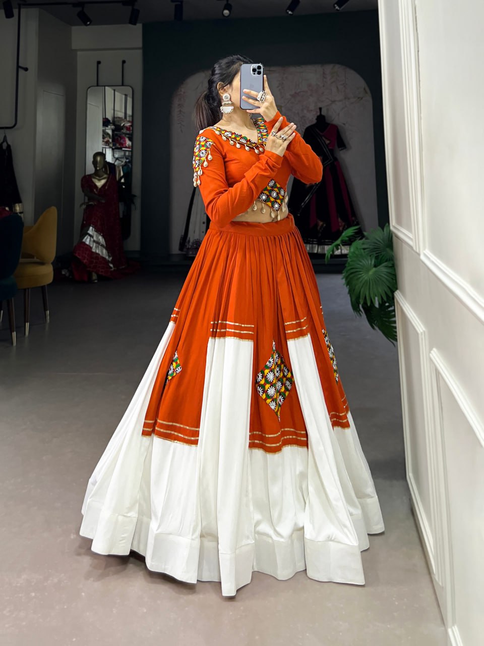 Kavya Orange & White Mirror Work and Shell Detailing Lehenga Set