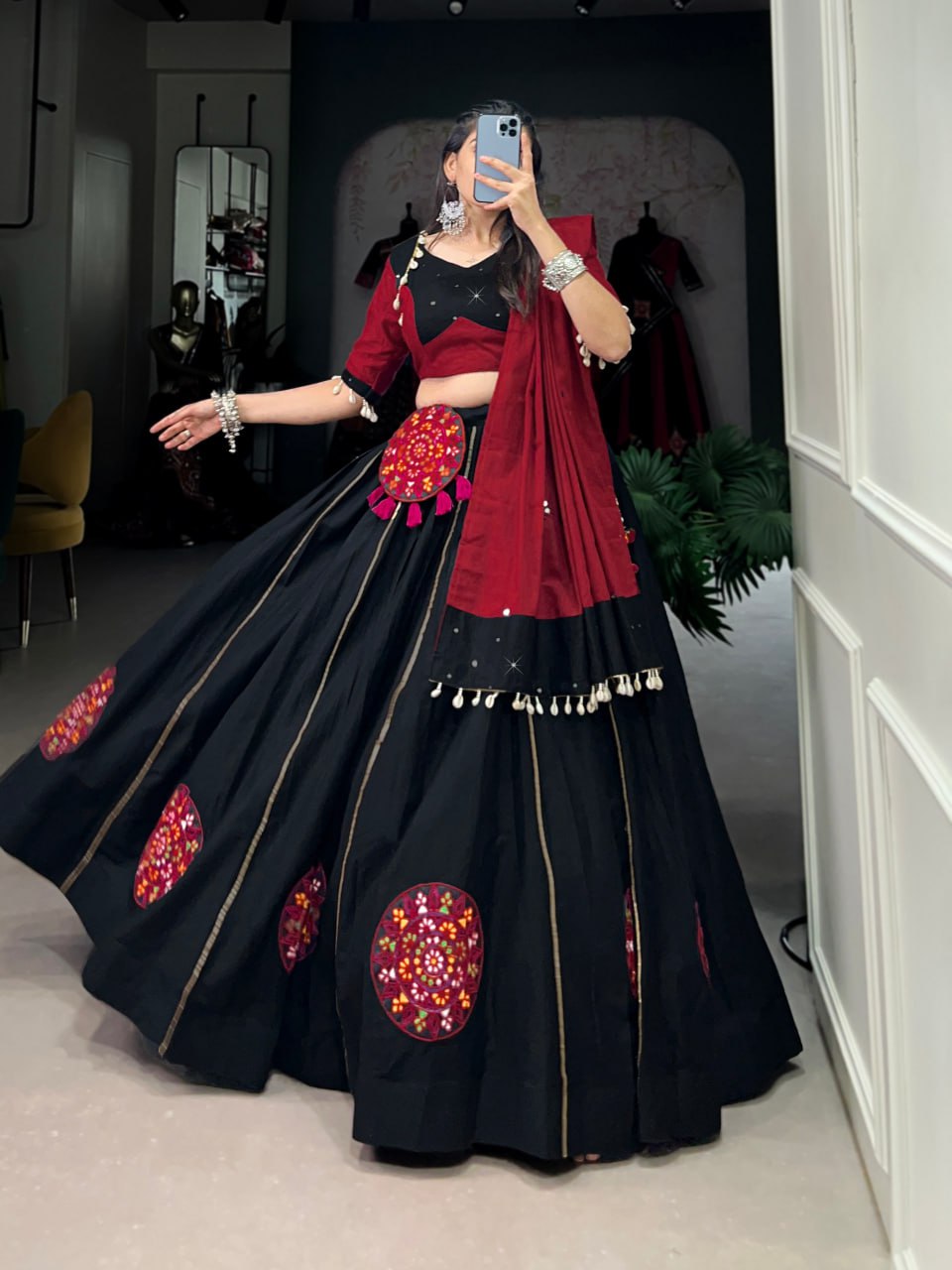 Krisha in Vibrant Garba Grace Black & Red Lehenga Choli