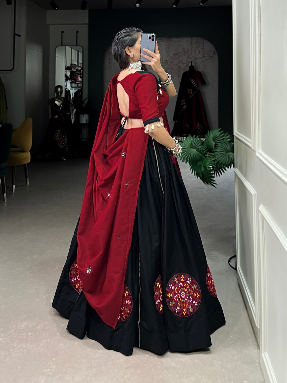 Krisha in Vibrant Garba Grace Black & Red Lehenga Choli
