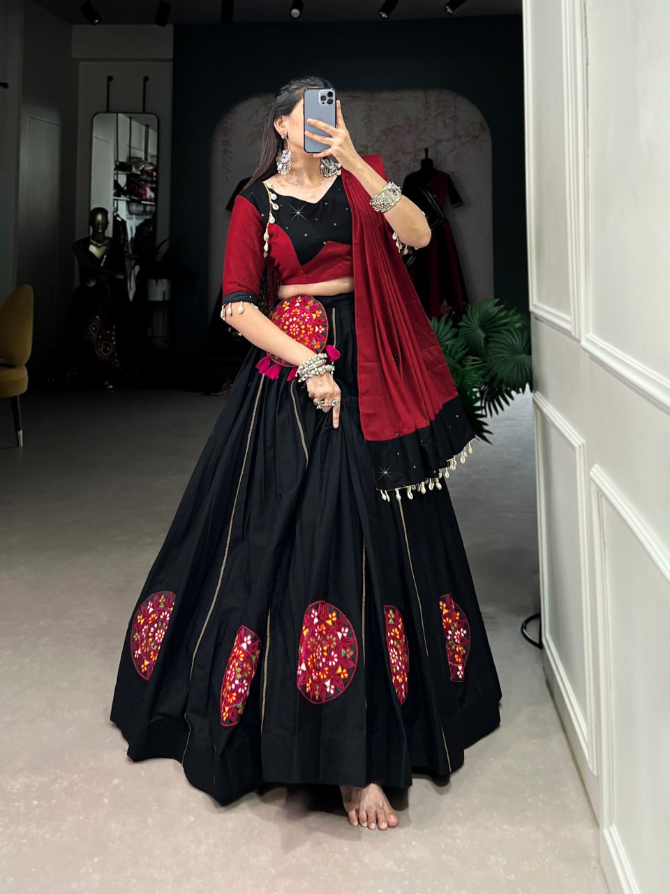 Krisha in Vibrant Garba Grace Black & Red Lehenga Choli