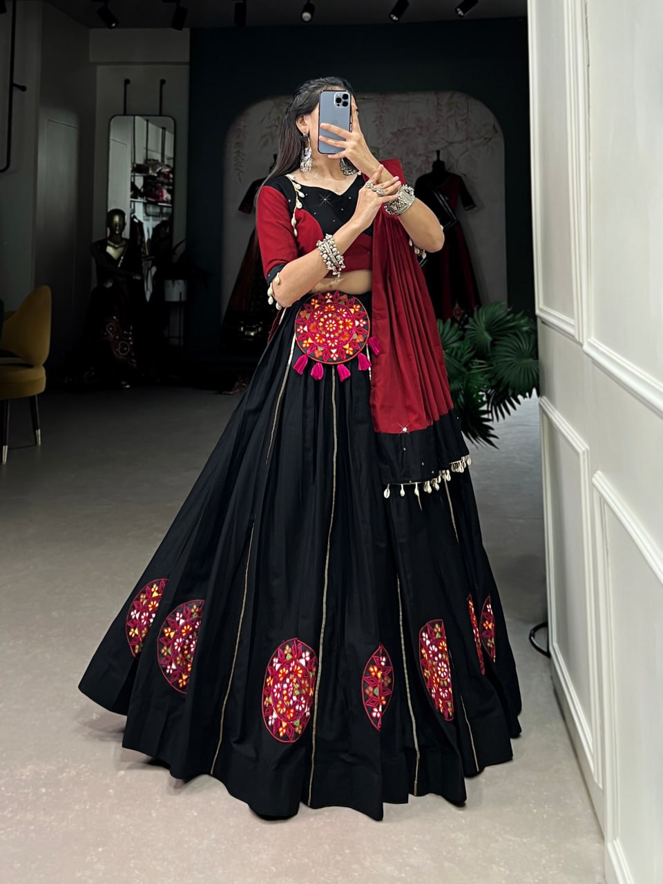 Krisha in Vibrant Garba Grace Black & Red Lehenga Choli