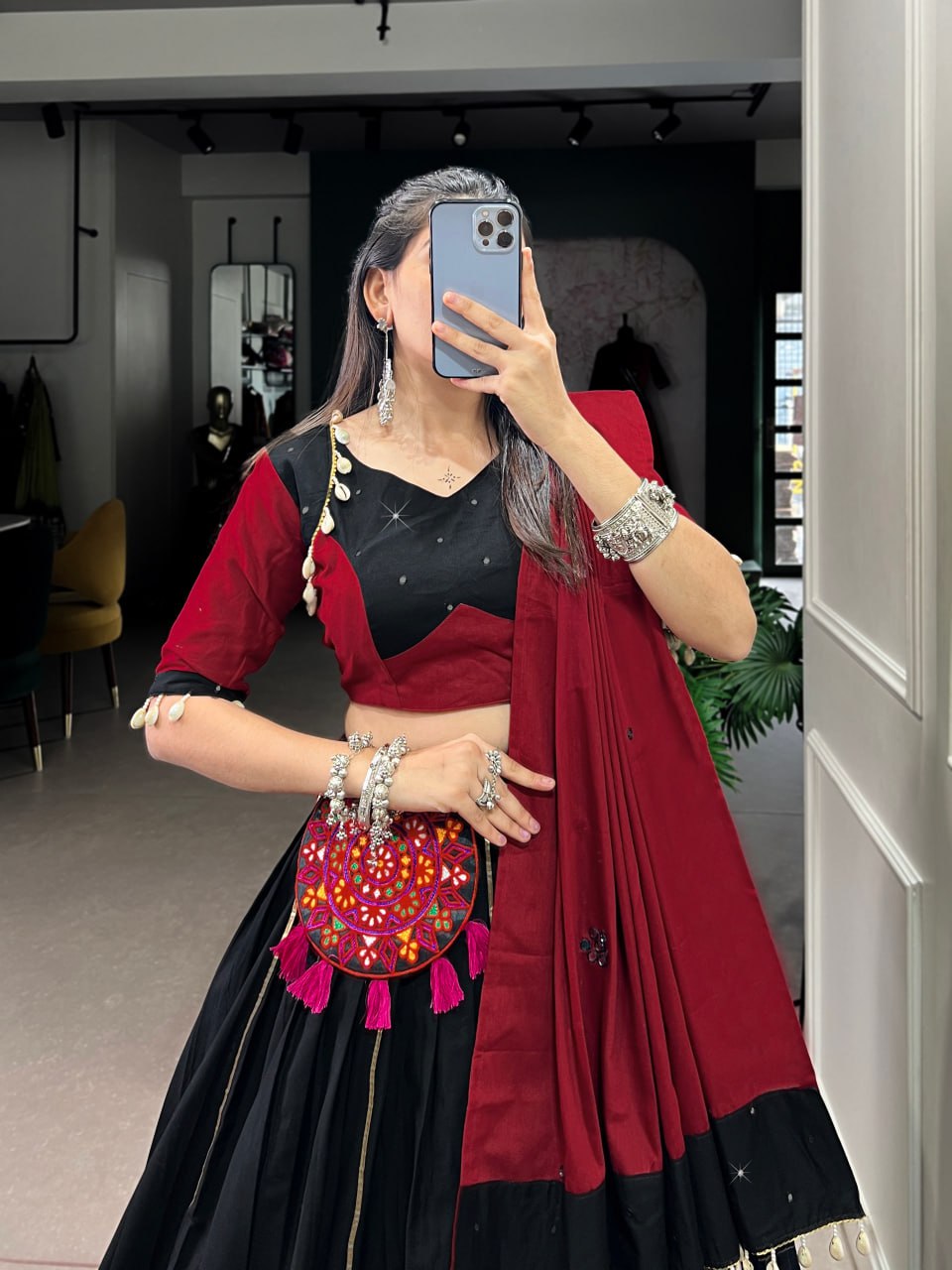 Krisha in Vibrant Garba Grace Black & Red Lehenga Choli