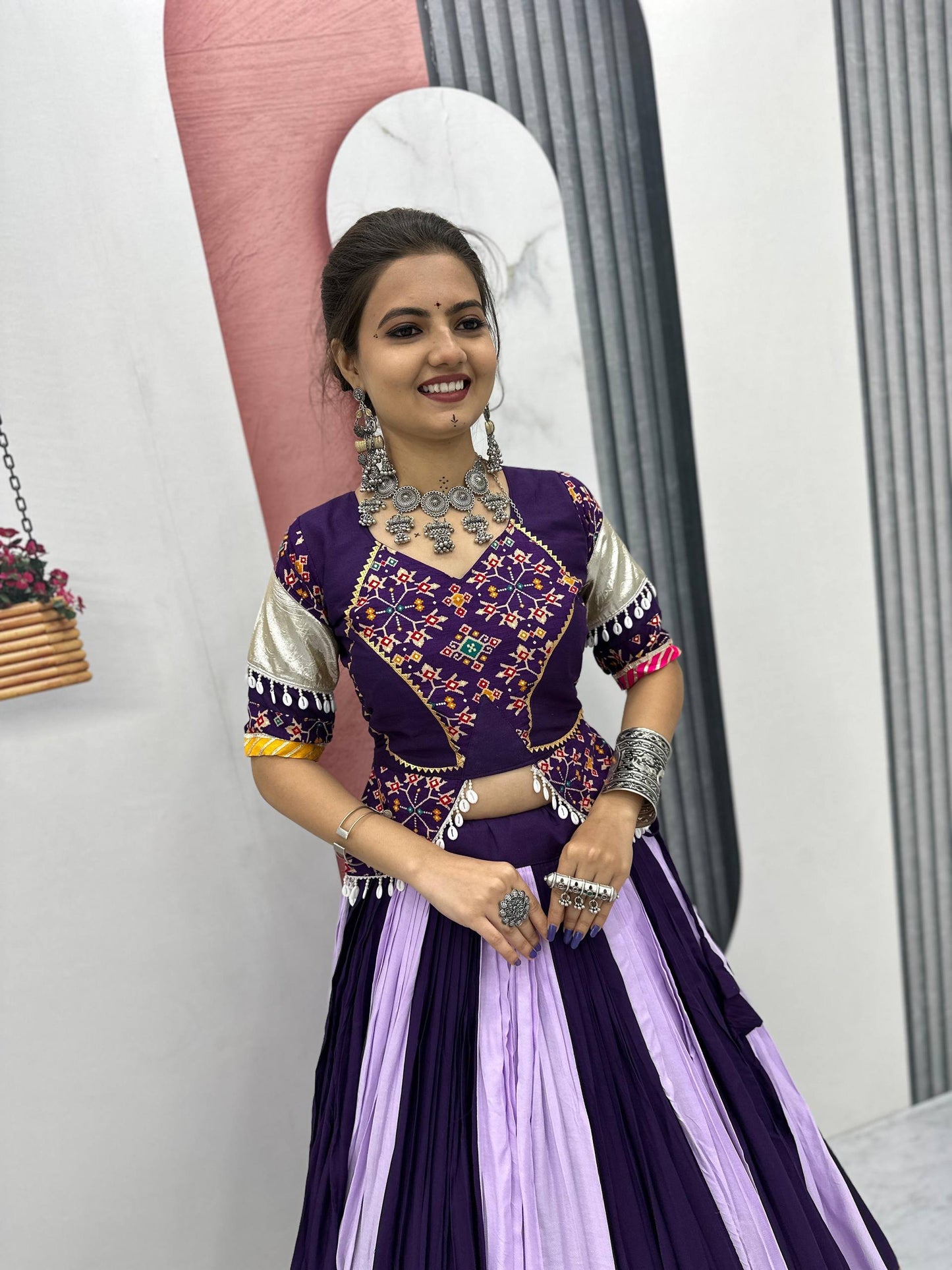 Vrinda's Vibrant Virasat Green & Purple Gamthi Navratri Lehenga Set