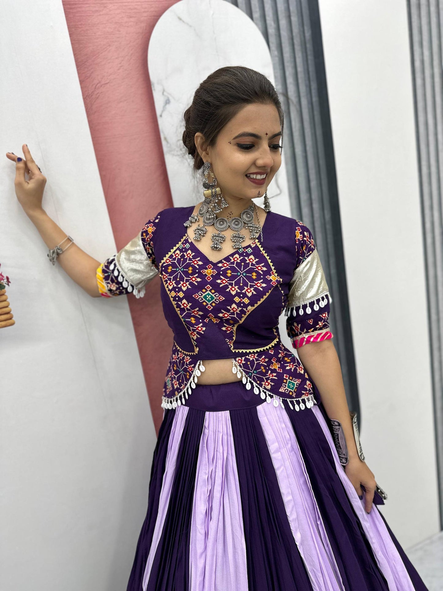 Vrinda's Vibrant Virasat Green & Purple Gamthi Navratri Lehenga Set
