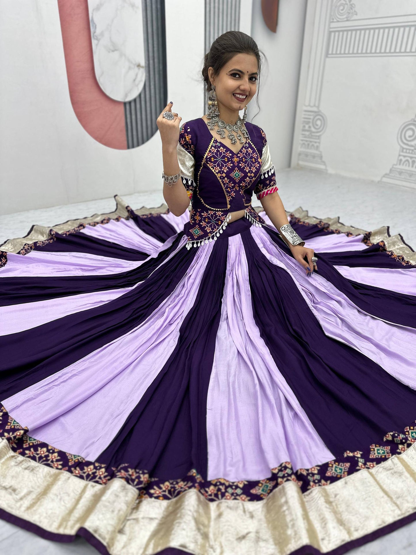 Vrinda's Vibrant Virasat Green & Purple Gamthi Navratri Lehenga Set
