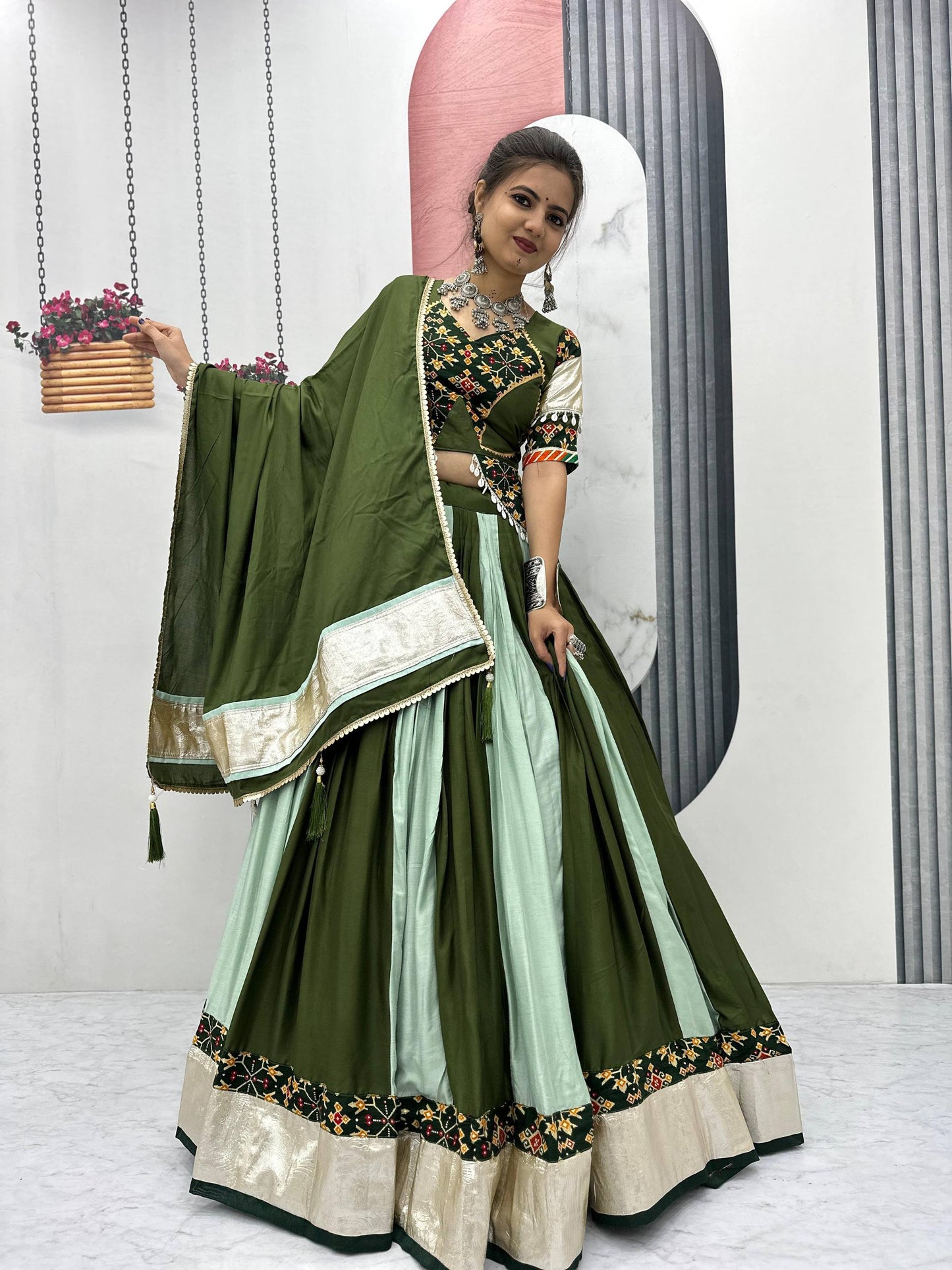Vrinda's Vibrant Virasat Green & Purple Gamthi Navratri Lehenga Set