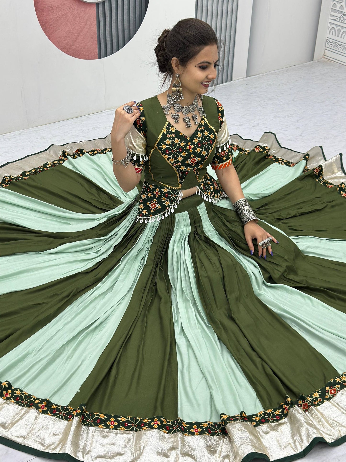Vrinda's Vibrant Virasat Green & Purple Gamthi Navratri Lehenga Set
