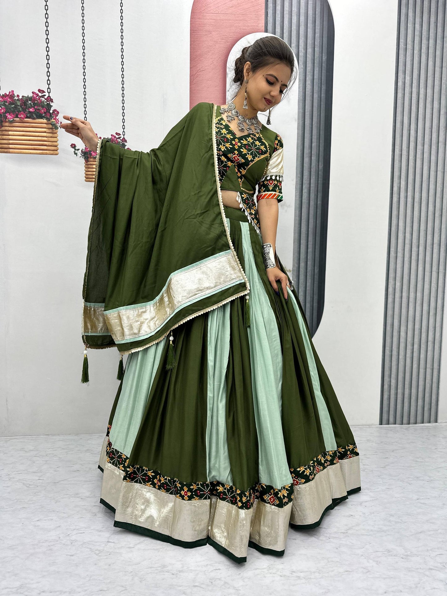 Vrinda's Vibrant Virasat Green & Purple Gamthi Navratri Lehenga Set