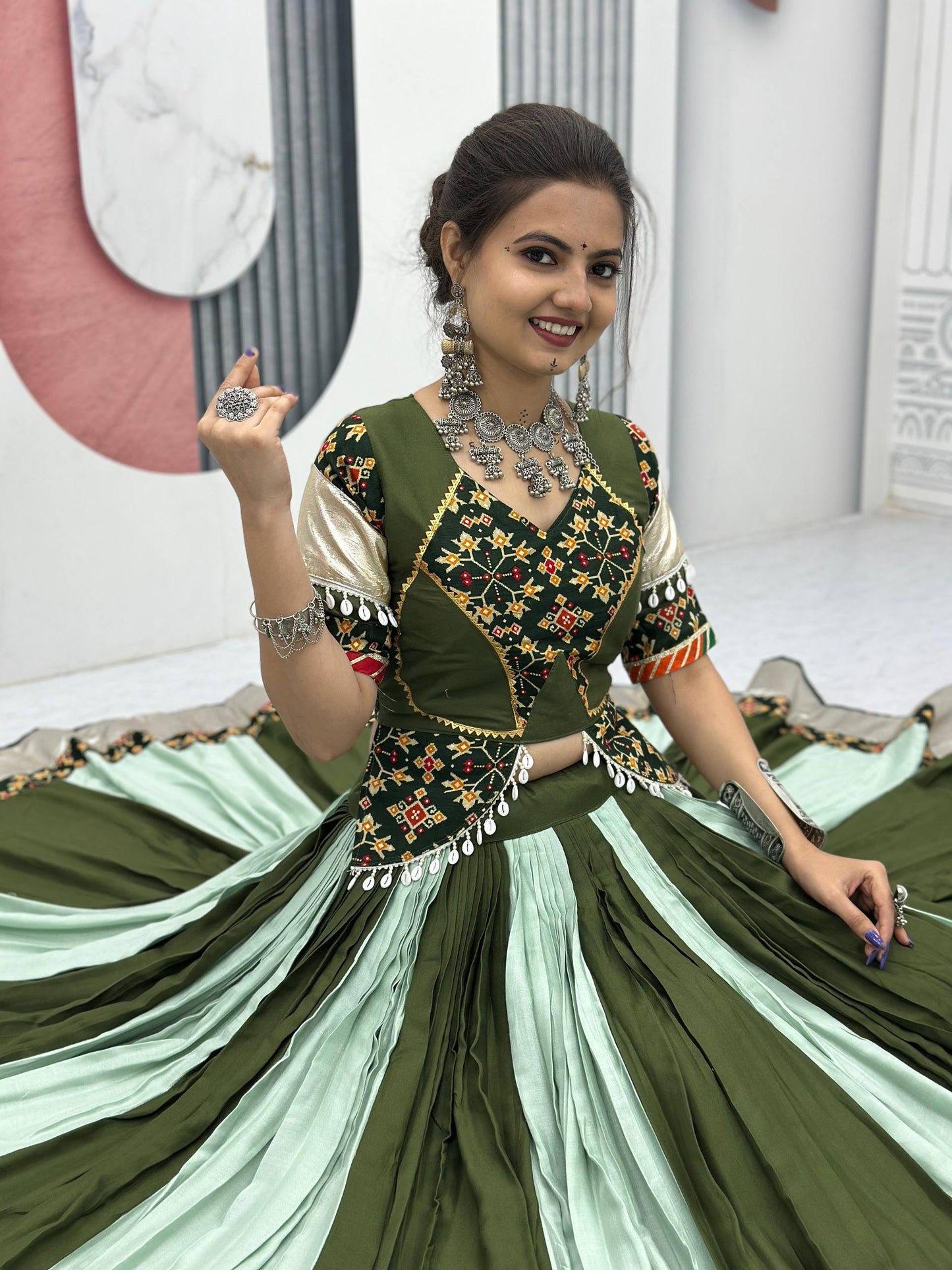 Vrinda's Vibrant Virasat Green & Purple Gamthi Navratri Lehenga Set