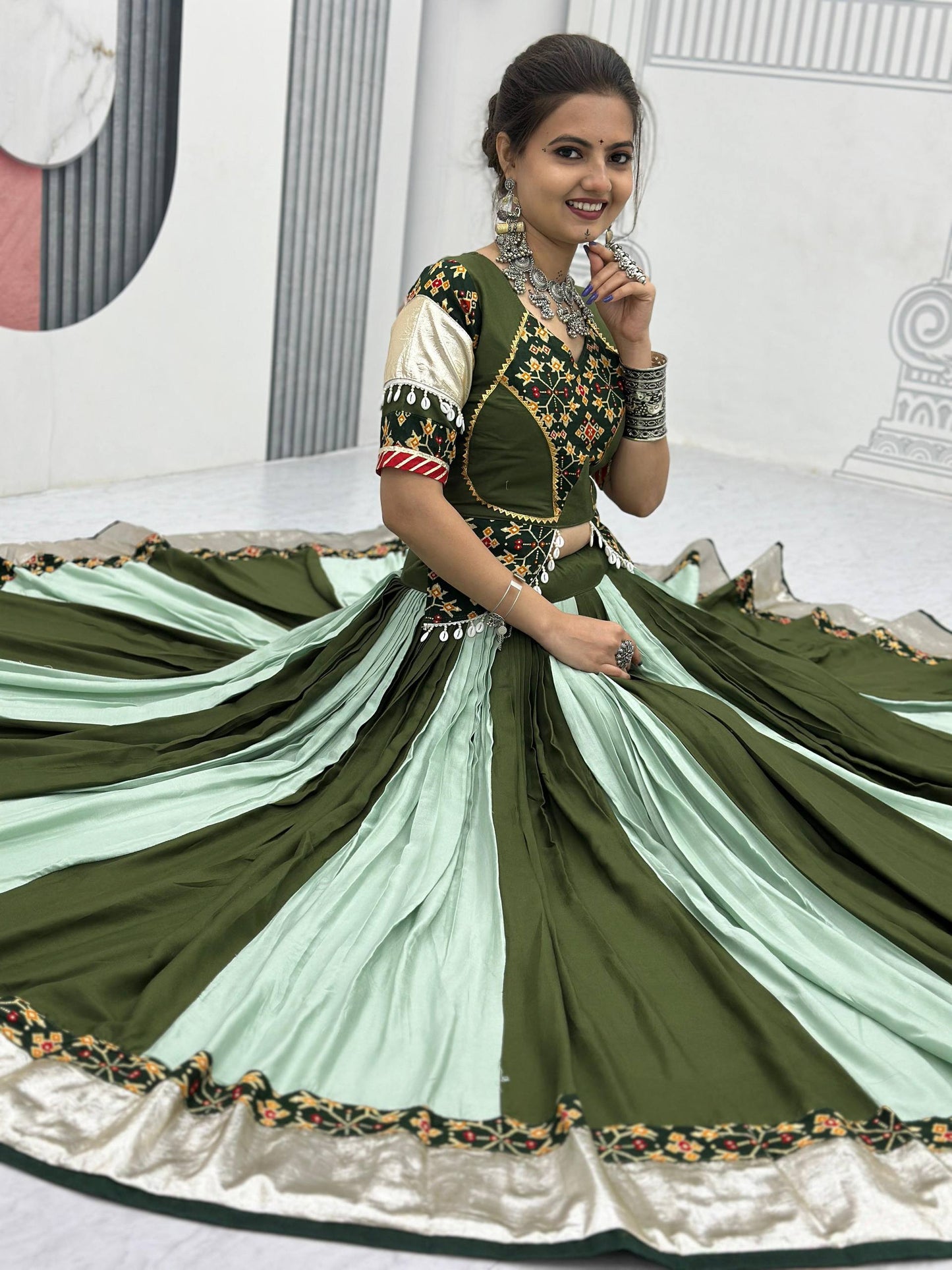Vrinda's Vibrant Virasat Green & Purple Gamthi Navratri Lehenga Set