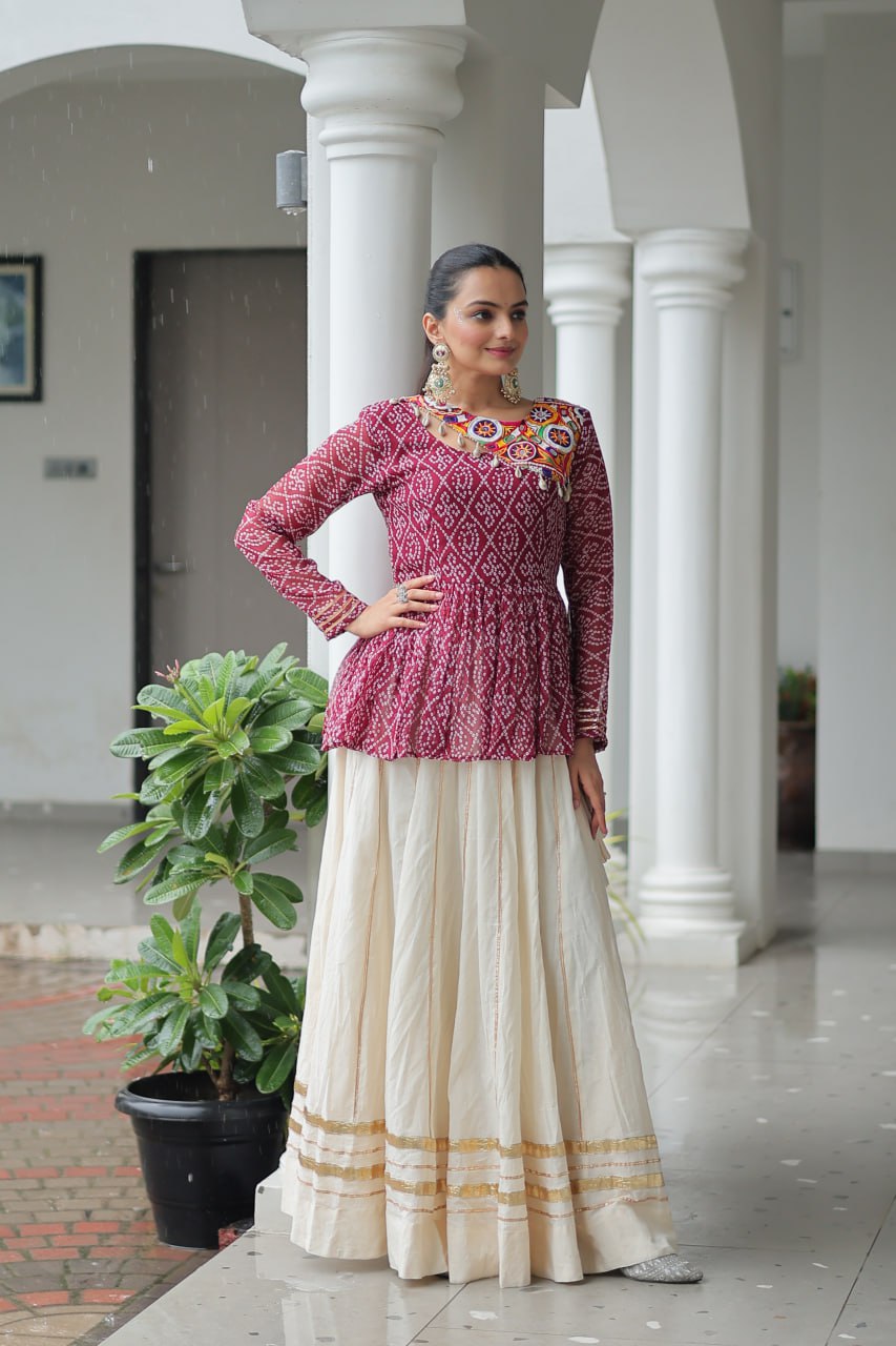 Devika’s Traditional Bandhani Print WIth Mirror Neckline Cream Flared Lehenga