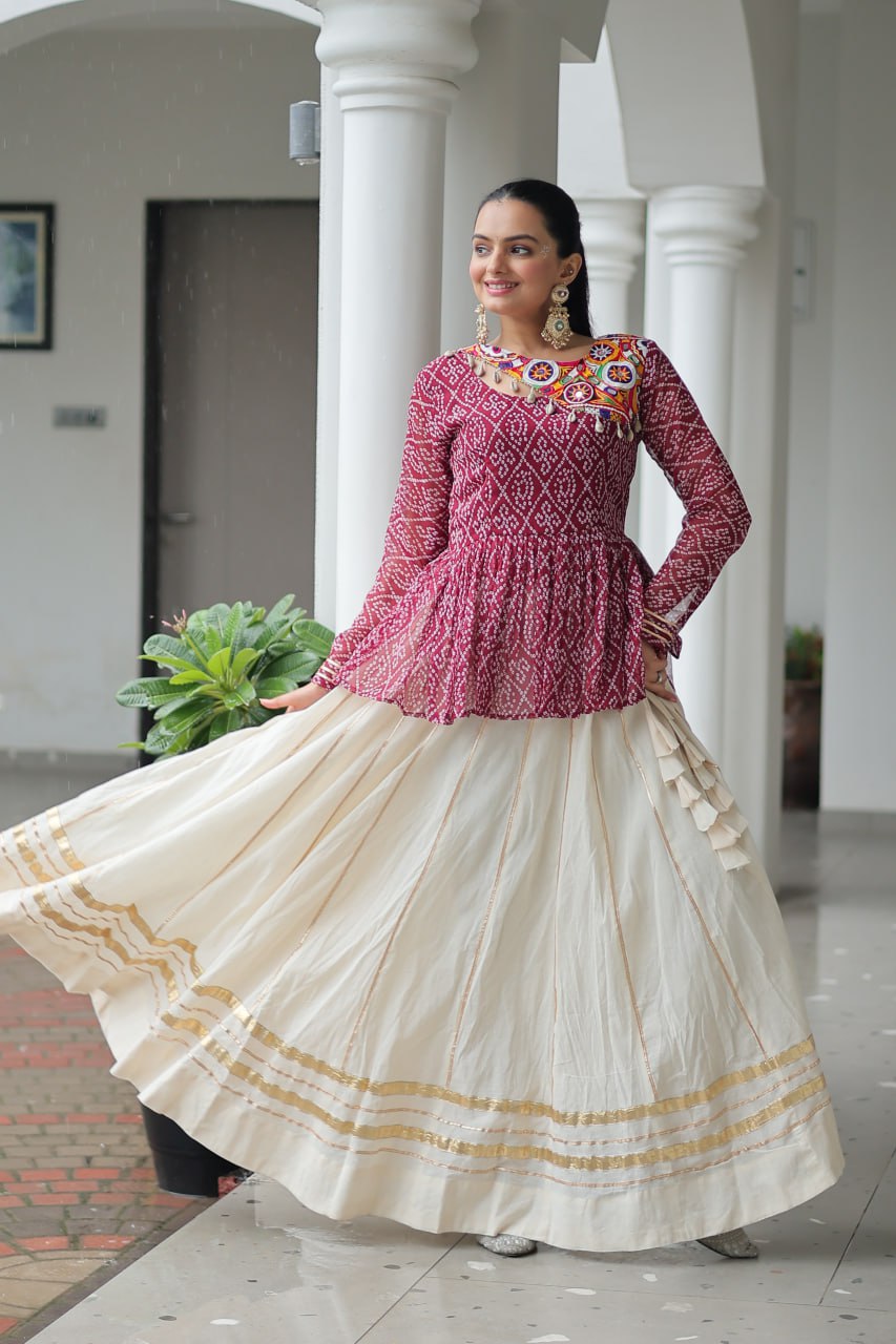 Devika’s Traditional Bandhani Print WIth Mirror Neckline Cream Flared Lehenga