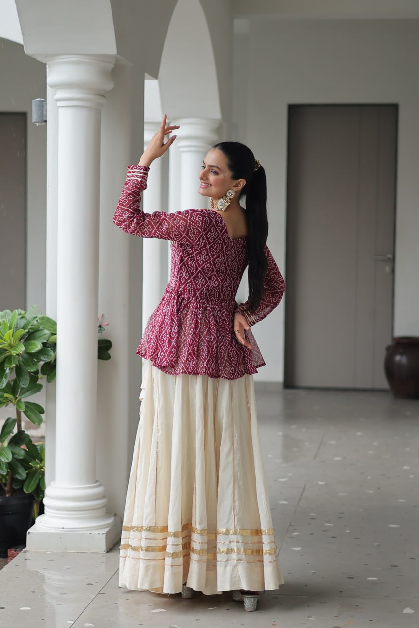 Devika’s Traditional Bandhani Print WIth Mirror Neckline Cream Flared Lehenga