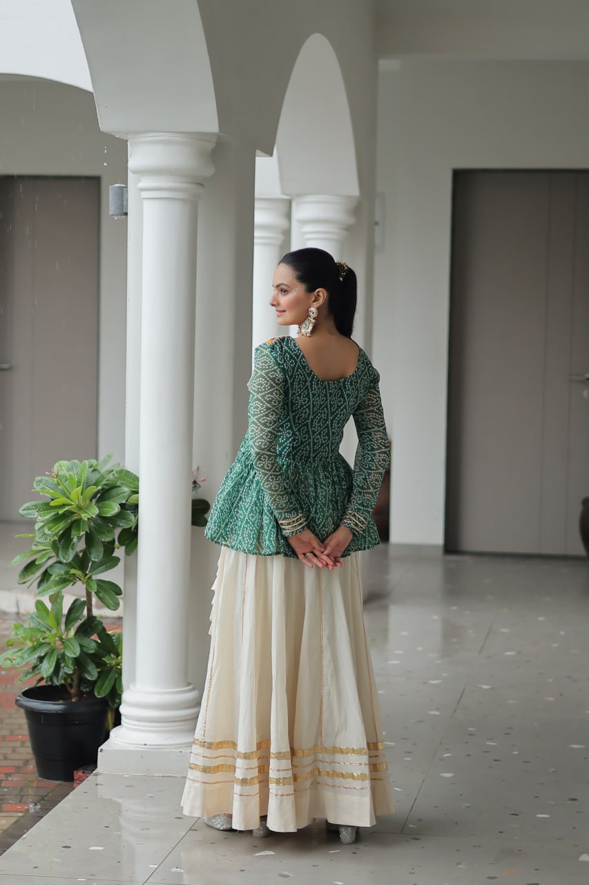 Devika’s Traditional Bandhani Print WIth Mirror Neckline Cream Flared Lehenga