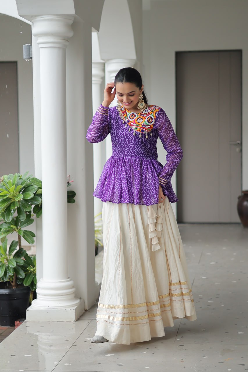 Devika’s Traditional Bandhani Print WIth Mirror Neckline Cream Flared Lehenga