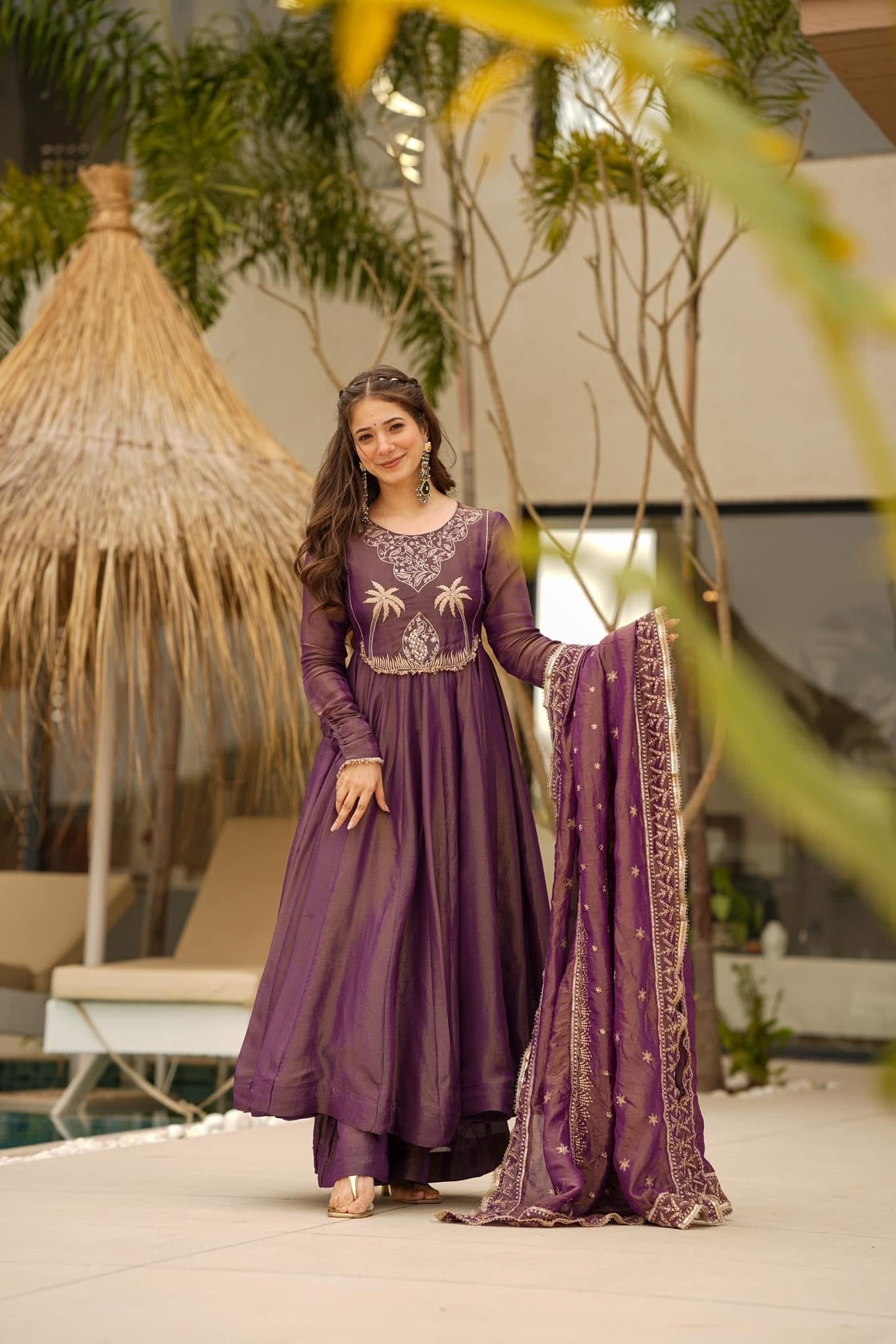 Elegance in Amethyst: Graceful Charm in Traditional Wear