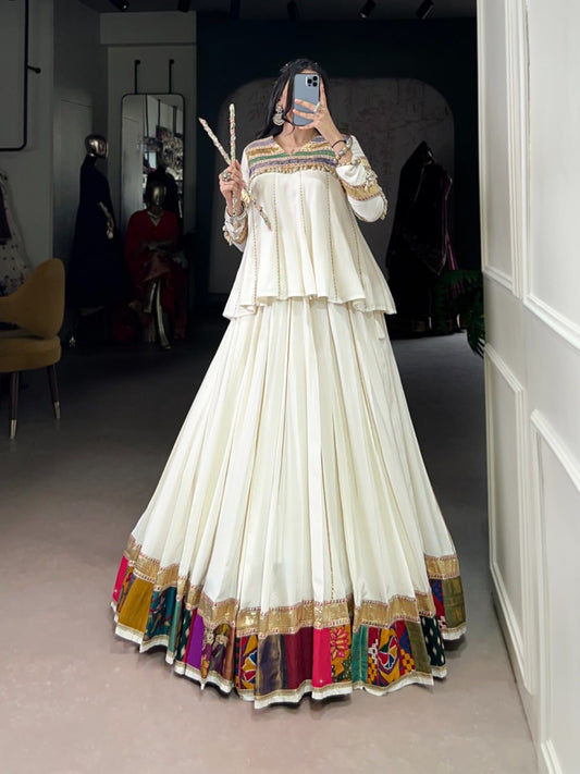 Navira in Ivory Mirror-Work Lehenga with Multicolour Border Magic