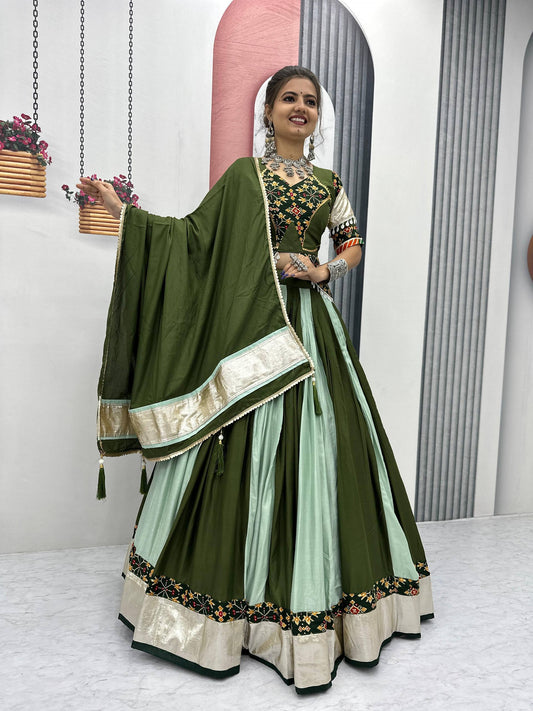 Vrinda's Vibrant Virasat  Green &  Purple Gamthi Navratri Lehenga Set