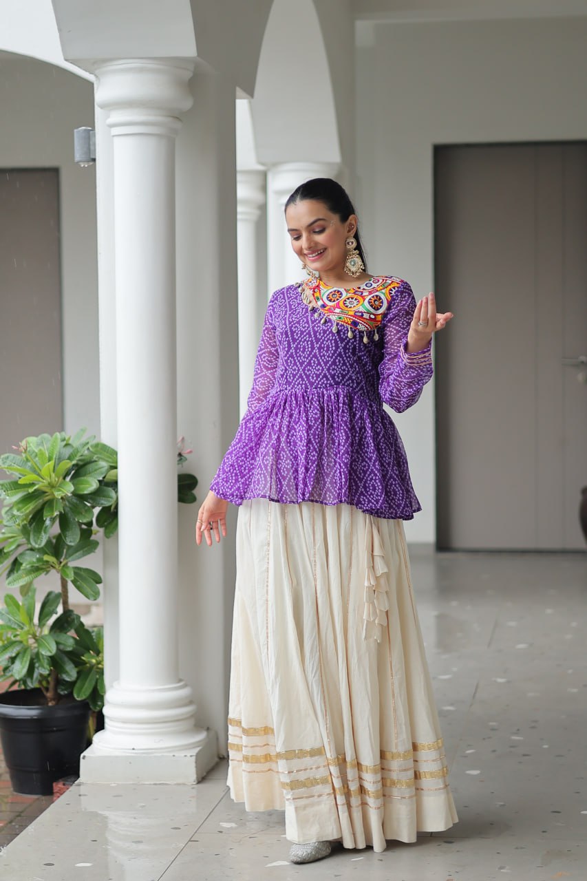 Devika’s Traditional  Bandhani Print  WIth  Mirror Neckline  Cream Flared Lehenga
